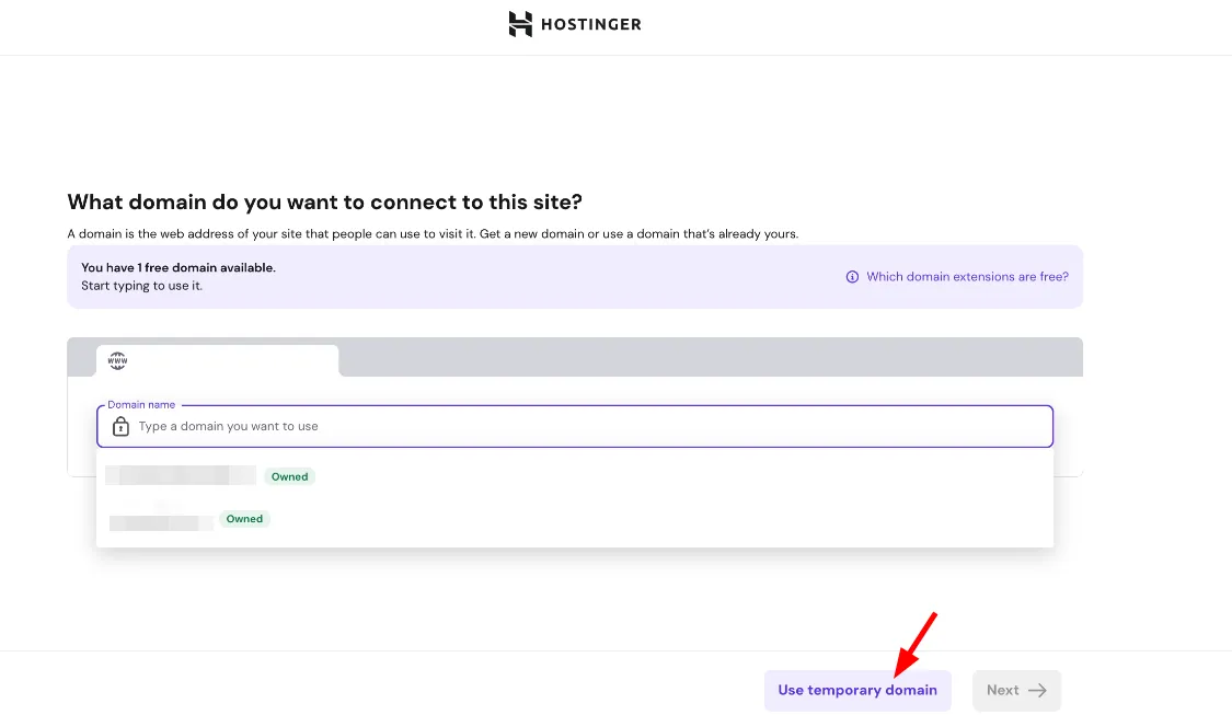 突出显示 Use temporary domain 按钮的 Hostinger 域名设置界面